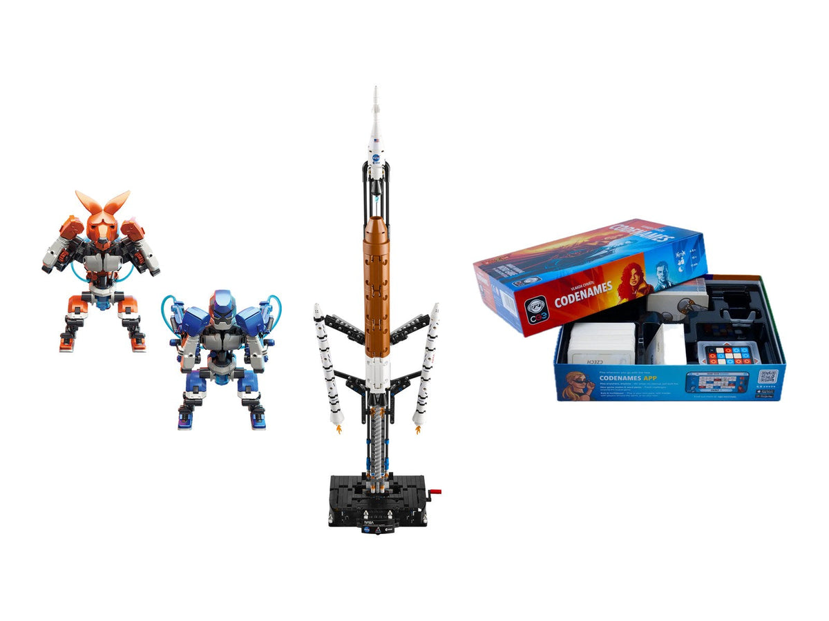Thames & Kosmos Hydraulic Boxing Bots, LEGO Technic NASA Artemis rocket and Codenames game on white