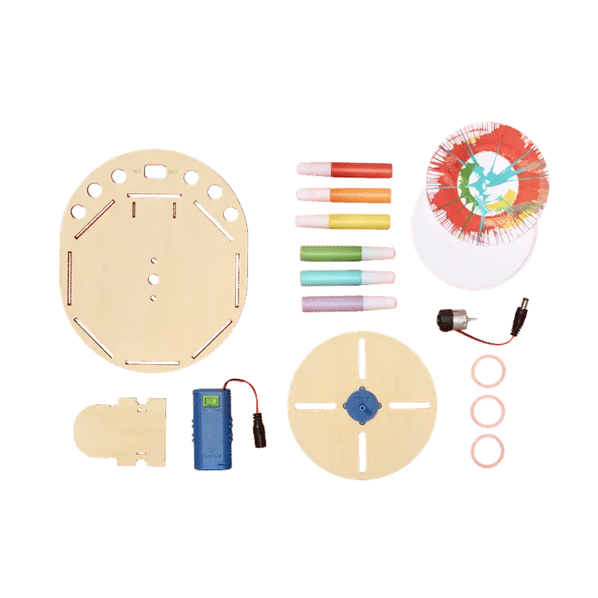 KiwiCo Kiwi Crate Motorized Spin Art project, crate contents laid out: wooden parts, motor, battery pack and paint pens