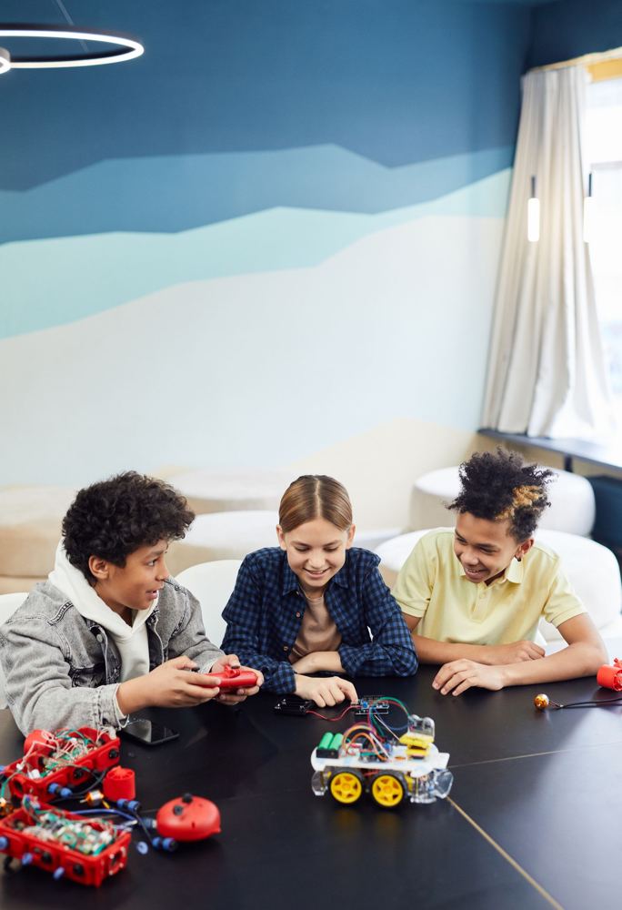 Three kids playing a game together